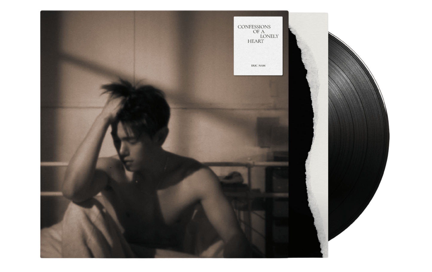 Confessions of A Lonely Heart Vinyl record with a vintage looking black and white photo of Eric Nam