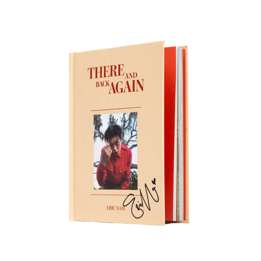 A hardcover photobook titled 'THERE AND BACK AGAIN' with a CD attached, both featuring a red and orange color scheme with a photo of a person on the cover.
