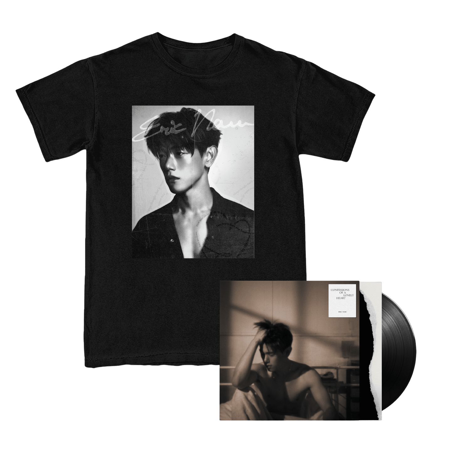 A black short-sleeve graphic T-shirt displayed with a vinyl record in front of it. The shirt features a large black-and-white portrait print on the chest of Eric Nam with a cursive signature reading 'Eric Nam' across the photo.