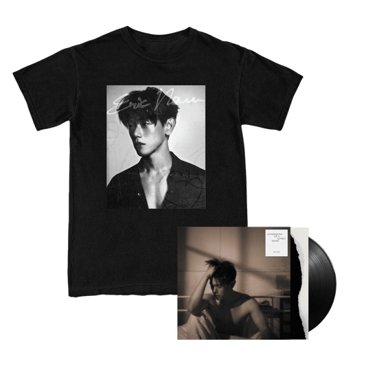 A black short-sleeve graphic T-shirt displayed with a vinyl record in front of it. The shirt features a large black-and-white portrait print on the chest of Eric Nam with a cursive signature reading 'Eric Nam' across the photo.